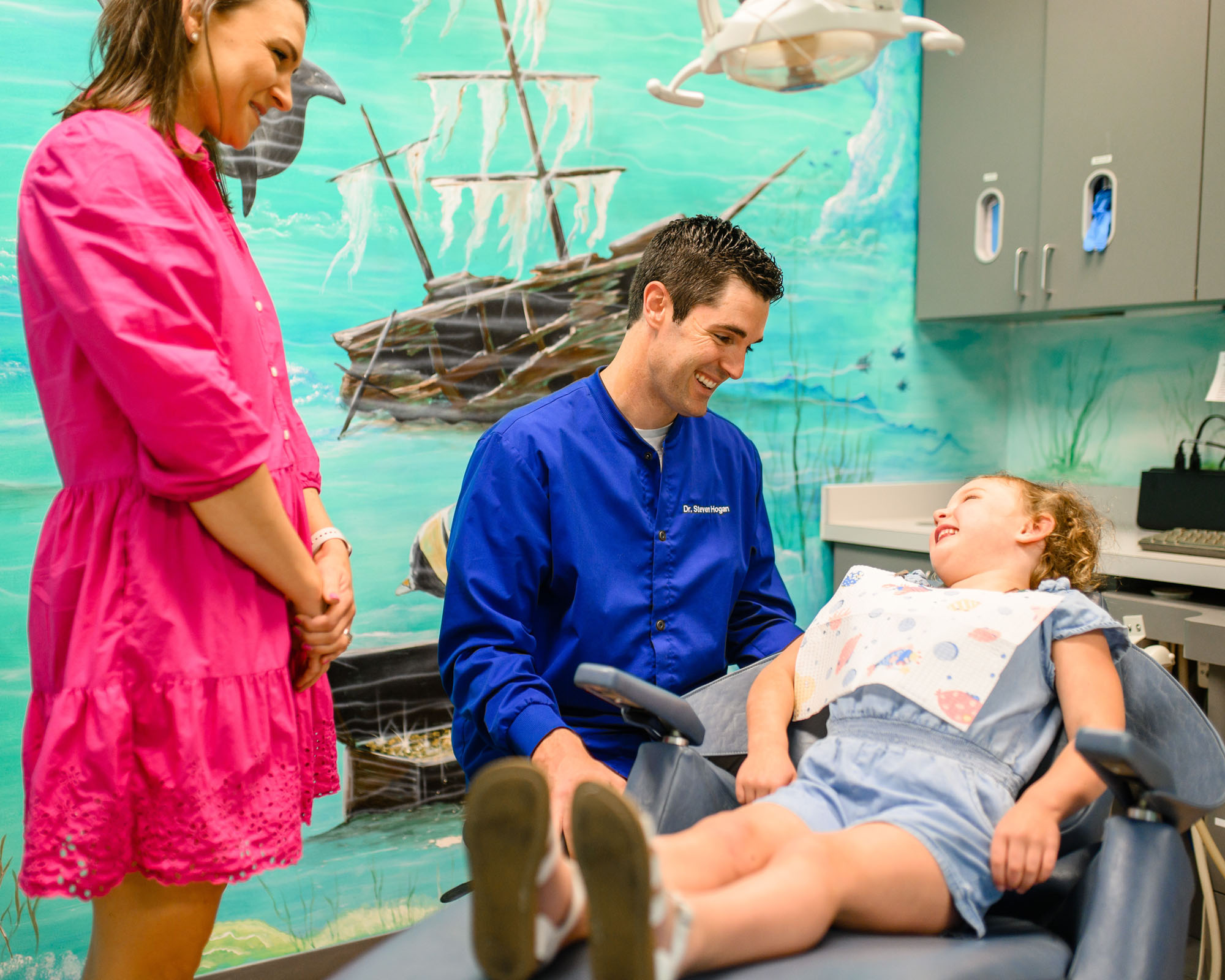 Dentist with child and mother | Pediatric Dentistry in Houston, TX